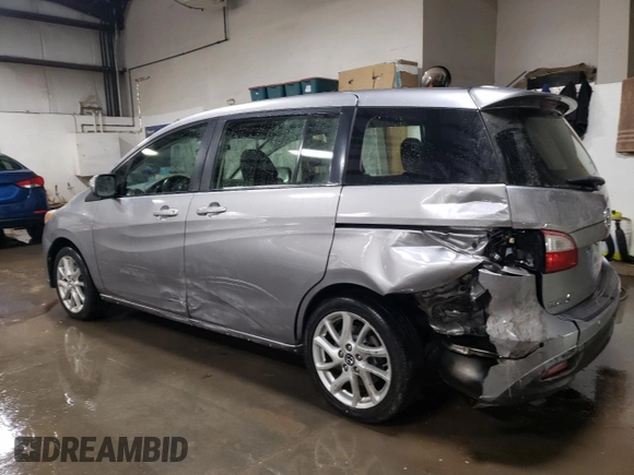 2015 Mazda 5 Grand Touring with VIN JM1CW2DL9F0181734, listed as a Copart auction lot 85604134 with 136,917 mi miles and Salvage title. Bid and sale history available at DreamBid. Image 2.