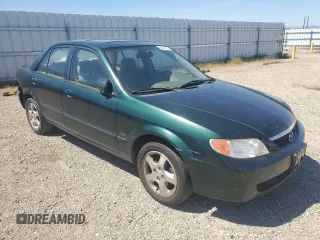 2002 Mazda Protege DX with VIN JM1BJ225121567924, listed as a Copart auction lot 54847545 with 93,653 mi miles and Salvage Title. Bid and sale history available at DreamBid. Image 4.