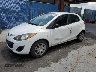 2013 Mazda 2 Sport z VIN JM1DE1KY6D0159753, wystawiony jako Copart lot #59078435 z przebiegiem 153 165 mil mil oraz Szkoda całkowita • Salvage title. Historia ofert i sprzedaży dostępna na DreamBid. Obrazek 1.