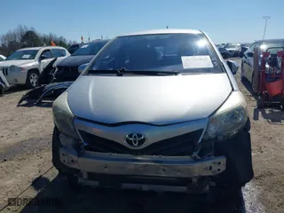 2014 Toyota Yaris L with VIN JTDKTUD32ED593419, listed as a IAAI auction lot 41780903 with 81,609 mi miles. Bid and sale history available at carsss.com. Image 6.