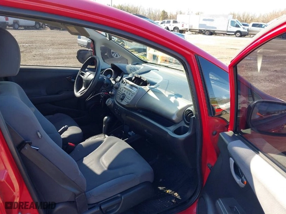 2009 Honda Fit with VIN JHMGE88219S036655, listed as a IAAI auction lot 41879820 with 209,454 mi miles. Bid and sale history available at carsss.com. Image 5.