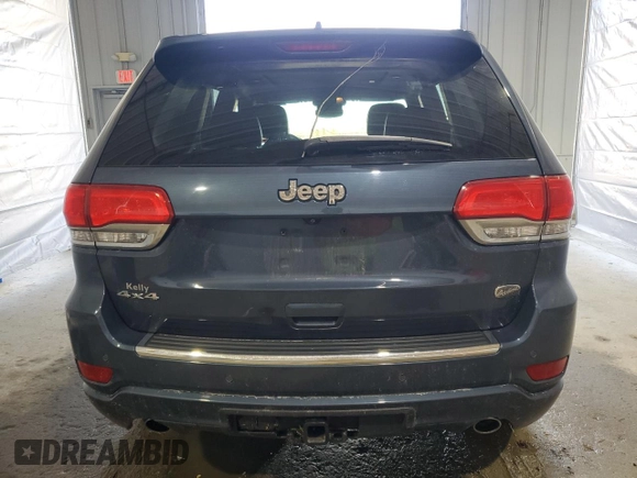 2019 Jeep Grand Cherokee Overland with VIN 1C4RJFCG2KC704332, listed as a Copart auction lot 51835855 with 47,975 mi miles and Salvage title. Bid and sale history available at DreamBid. Image 6.