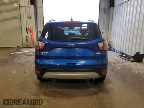 2018 Ford Escape SE z VIN 1FMCU9GD7JUB25596, wystawiony jako Copart lot #43562375 z przebiegiem 115 496 mil mil oraz Nie do naprawy • Non repairable. Historia ofert i sprzedaży dostępna na DreamBid. Obrazek 6.