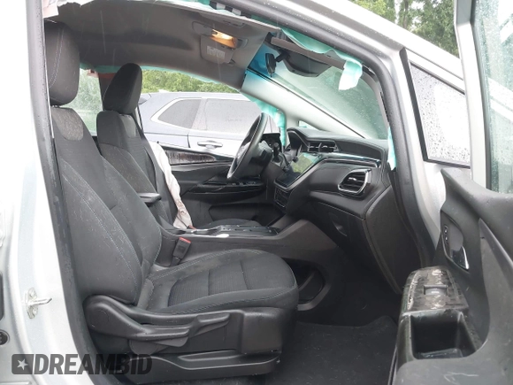 2023 Chevrolet Bolt EV 1LT with VIN 1G1FW6S03P4140824, listed as a IAAI auction lot 42383006 with 23,942 mi miles and . Bid and sale history available at DreamBid. Image 5.