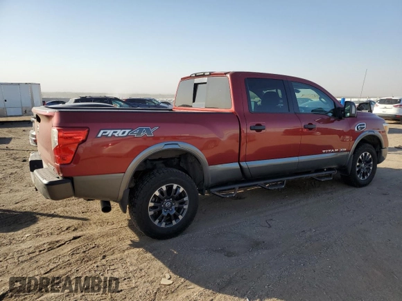 2016 Nissan Titan XD PRO-4X with VIN 1N6BA1F43GN512559, listed as a Copart auction lot 82991154 with 0 mi miles and Salvage Title. Bid and sale history available at carsss.com. Image 3.