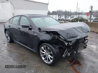 2021 Cadillac CT5 V-Series with VIN 1G6DV5RW2M0144133, listed as a IAAI auction lot 41257710 with 51,388 mi miles and . Bid and sale history available at DreamBid. Image 1.