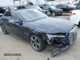 2018 Audi A4 Premium Plus z VIN WAULMAF41JN011396, wystawiony jako IAAI lot #42174030 z przebiegiem 74 090 mil mil oraz . Historia ofert i sprzedaży dostępna na DreamBid. Obrazek 1.