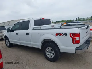 2018 Ford F-150 XL with VIN 1FTFW1E58JKE22834, listed as a IAAI auction lot 41923960 with 214,459 mi miles. Bid and sale history available at carsss.com. Image 15.