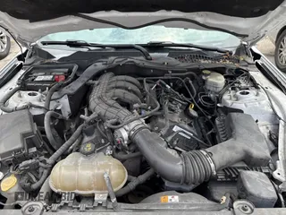 2016 Ford Mustang V6 with VIN 1FA6P8AM6G5336289, listed as a Copart auction lot 60267765 with 104,913 mi miles and Clean title. Bid and sale history available at DreamBid. Image 7.