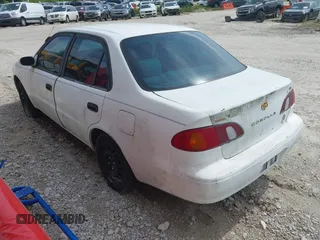 2001 Toyota Corolla CE with VIN 1NXBR12E41Z509303, listed as a IAAI auction lot 42656901 with 327,188 mi miles and . Bid and sale history available at DreamBid. Image 3.