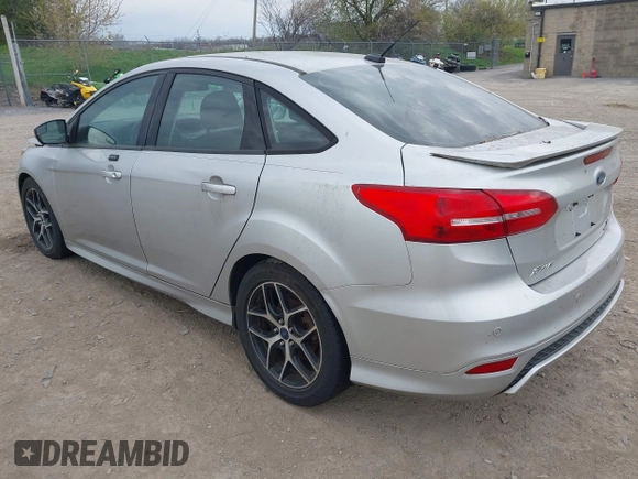 2016 Ford Focus SE with VIN 1FADP3F20GL228831, listed as a IAAI auction lot 42115033 with 106,975 mi miles. Bid and sale history available at carsss.com. Image 3.