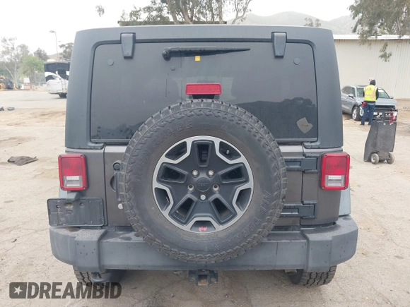 2014 Jeep Wrangler Unlimited Sport with VIN 1C4BJWDG7EL244749, listed as a IAAI auction lot 41871127 with 128,420 mi miles and . Bid and sale history available at DreamBid. Image 17.