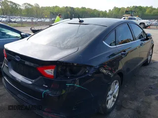 2016 Ford Fusion SE with VIN 1FA6P0H79G5124150, listed as a IAAI auction lot 42001241 with 198,889 mi miles and . Bid and sale history available at DreamBid. Image 4.