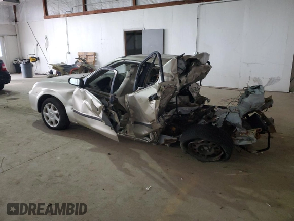 2002 Mazda Protege DX with VIN JM1BJ225021583998, listed as a Copart auction lot 49874135 with Not Provided miles and Non Repairable. Bid and sale history available at DreamBid. Image 2.