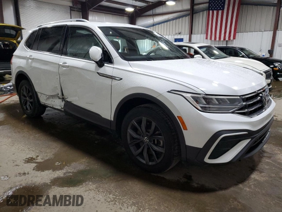 2022 Volkswagen Tiguan SE z VIN 3VV2B7AX9NM106198, wystawiony jako Copart lot #59867485 z przebiegiem 23 940 mil mil oraz Szkoda całkowita • Salvage title. Historia ofert i sprzedaży dostępna na DreamBid. Obrazek 4.