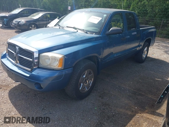 2005 Dodge Dakota SLT z VIN 1D7HE48K25S163588, wystawiony jako IAAI lot #42269518 z przebiegiem 177 850 mil mil oraz . Historia ofert i sprzedaży dostępna na DreamBid. Obrazek 2.