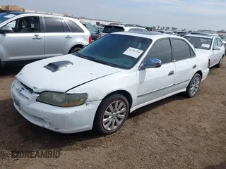 2000 Honda Accord EX z VIN 1HGCG1654YA065958, wystawiony jako IAAI lot #41734784 z przebiegiem 293 577 mil mil oraz . Historia ofert i sprzedaży dostępna na DreamBid. Obrazek 2.