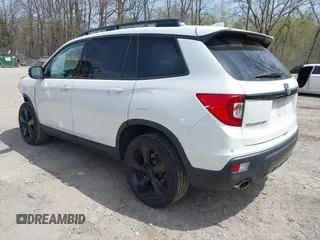 2021 Honda Passport Elite z VIN 5FNYF8H08MB014739, wystawiony jako IAAI lot #42137913 z przebiegiem 50 580 mil mil oraz . Historia ofert i sprzedaży dostępna na DreamBid. Obrazek 3.