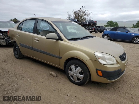 2009 Kia Rio LX with VIN KNADE223496549097, listed as a Copart auction lot 54375975 with 140,882 mi miles and Salvage Title. Bid and sale history available at DreamBid. Image 4.