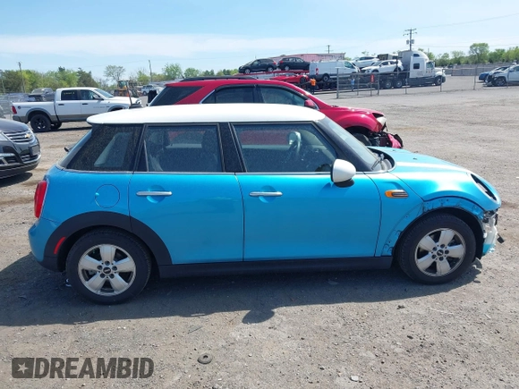 2017 MINI Hardtop 4 Door Cooper with VIN WMWXU1C32H2F78602, listed as a IAAI auction lot 42076854 with 43,270 mi miles and . Bid and sale history available at DreamBid. Image 14.