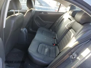 2014 Volkswagen Jetta SEL z VIN 3VWL17AJ6EM438176, wystawiony jako Copart lot #85081294 z przebiegiem 108 420 mil mil oraz Szkoda całkowita • Salvage title. Historia ofert i sprzedaży dostępna na DreamBid. Obrazek 10.