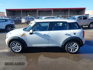 2013 MINI Countryman with VIN WMWZB3C52DWR35806, listed as a IAAI auction lot 42184010 with 93,380 mi miles and . Bid and sale history available at DreamBid. Image 14.
