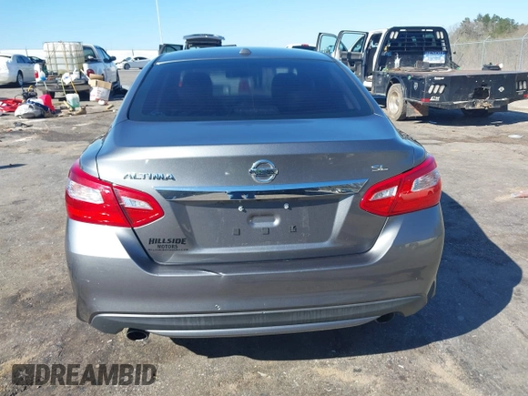 2016 Nissan Altima S z VIN 1N4AL3AP8GC139770, wystawiony jako IAAI lot #41750812 z przebiegiem 116 717 mil mil oraz . Historia ofert i sprzedaży dostępna na DreamBid. Obrazek 16.