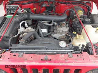 1999 Jeep Wrangler Sport z VIN 1J4FY19S0XP482218, wystawiony jako IAAI lot #42374995 z przebiegiem 149 216 mil mil oraz . Historia ofert i sprzedaży dostępna na DreamBid. Obrazek 10.