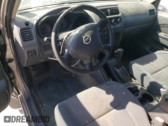 2002 Nissan Frontier SE with VIN 1N6ED27T52C383700, listed as a Copart auction lot 86204074 with 216,908 mi miles and Salvage title. Bid and sale history available at DreamBid. Image 8.