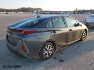 2018 Toyota Prius Prime Plus with VIN JTDKARFP7J3077320, listed as a IAAI auction lot 41780069 with 121,509 mi miles. Bid and sale history available at carsss.com. Image 4.
