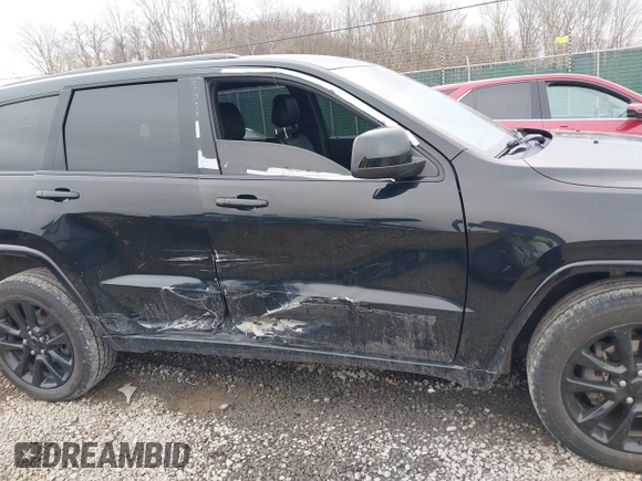 2017 Jeep Grand Cherokee Laredo with VIN 1C4RJFAG9HC882251, listed as a IAAI auction lot 41696710 with 129,627 mi miles and . Bid and sale history available at DreamBid. Image 6.