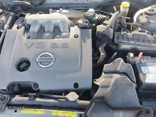 2003 Nissan Maxima SE z VIN JN1DA31D33T509135, wystawiony jako IAAI lot #41648488 z przebiegiem Nie podano mil oraz . Historia ofert i sprzedaży dostępna na DreamBid. Obrazek 10.