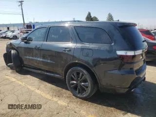 2012 Dodge Durango R/T with VIN 1C4SDHCT7CC321652, listed as a Copart auction lot 51764035 with 173,287 mi miles and Salvage title. Bid and sale history available at DreamBid. Image 2.