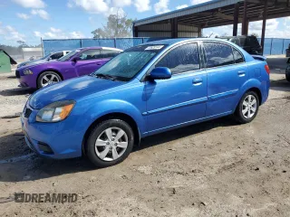 2010 Kia Rio LX with VIN KNADH4A33A6632951, listed as a Copart auction lot 72629144 with 168,289 mi miles and Salvage Title. Bid and sale history available at DreamBid. Image 1.
