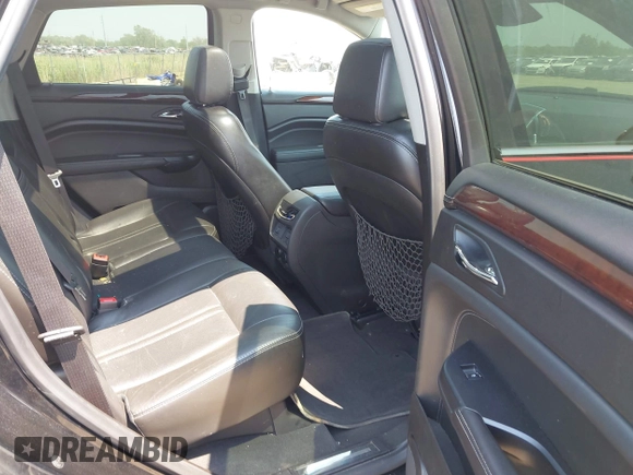 2015 Cadillac SRX Premium Collection with VIN 3GYFNDE38FS569129, listed as a IAAI auction lot 42485655 with 96,717 mi miles and . Bid and sale history available at DreamBid. Image 8.