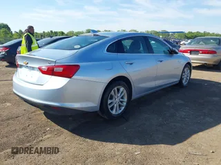 2018 Chevrolet Malibu LT z VIN 1G1ZD5ST4JF225982, wystawiony jako IAAI lot #42290615 z przebiegiem 122 483 mil mil oraz . Historia ofert i sprzedaży dostępna na DreamBid. Obrazek 4.