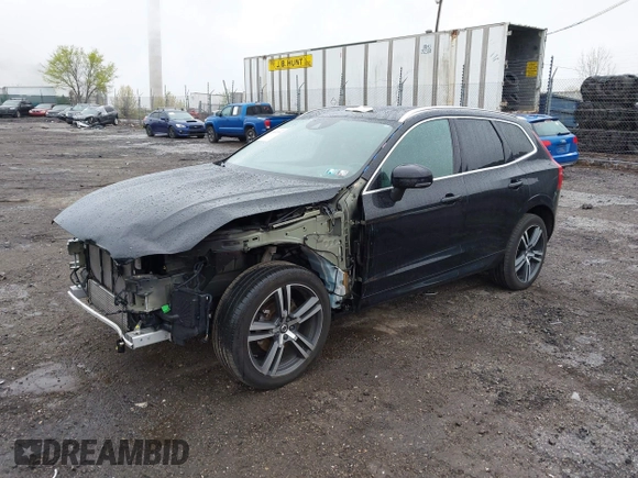 2019 Volvo XC60 Momentum z VIN LYV102RK9KB297120, wystawiony jako IAAI lot #41957299 z przebiegiem 71 402 mil mil oraz . Historia ofert i sprzedaży dostępna na DreamBid. Obrazek 20.