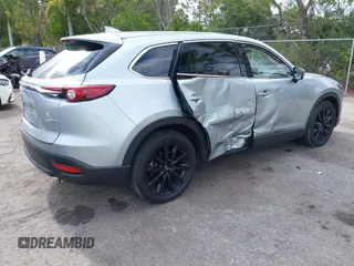 2023 Mazda CX-9 Touring Plus with VIN JM3TCBAY7P0652913, listed as a IAAI auction lot 42186917 with 20,649 mi miles and . Bid and sale history available at DreamBid. Image 4.