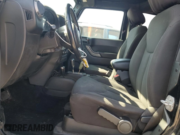 2017 Jeep Wrangler Sport z VIN 1C4GJWAG4HL753650, wystawiony jako Copart lot #62790205 z przebiegiem 52 550 mil mil oraz Szkoda całkowita • Salvage title. Historia ofert i sprzedaży dostępna na DreamBid. Obrazek 7.