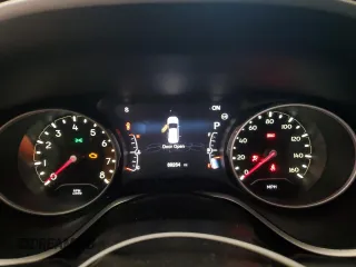 2018 Jeep Compass Latitude z VIN 3C4NJDBB8JT143193, wystawiony jako Copart lot #53061015 z przebiegiem 89 264 mil mil oraz Tytuł czysty. Historia ofert i sprzedaży dostępna na DreamBid. Obrazek 9.