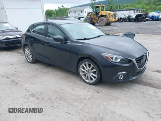 2014 Mazda 3 S Grand Touring with VIN JM1BM1M31E1185779, listed as a IAAI auction lot 42266546 with 138,394 mi miles and . Bid and sale history available at DreamBid. Image 1.
