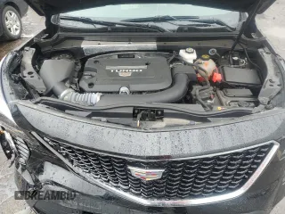 2022 Cadillac XT4 AWD Sport с VIN 1GYFZFR46NF170841, выставлен на аукционе Copart как лот 55863705 с пробегом 14 745 миль миль и Списание • Salvage title. История ставок и продаж доступна на DreamBid. Изображение 12.