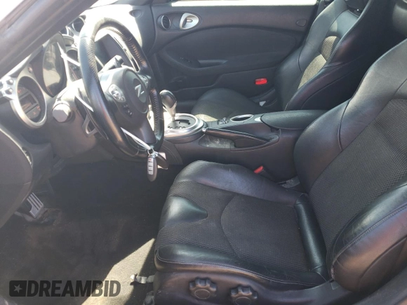 2014 Nissan 370Z Touring with VIN JN1AZ4FH4EM620612, listed as a Copart auction lot 47163375 with 148,458 mi miles and Clean Title. Bid and sale history available at DreamBid. Image 7.