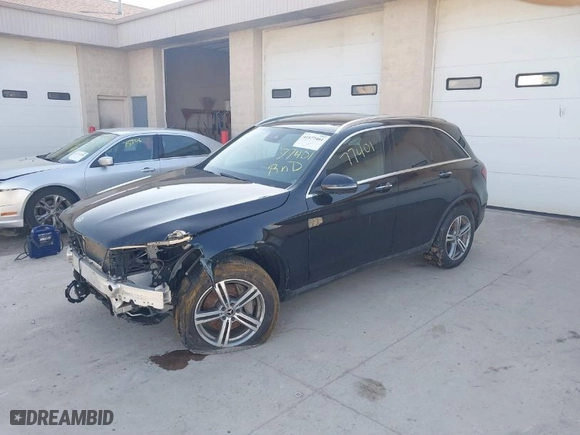 2021 Mercedes-Benz GLC with VIN W1N0G8EB0MF910294, listed as a IAAI auction lot 41577401 with 63,037 mi miles. Bid and sale history available at carsss.com. Image 2.