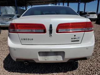2012 Lincoln MKZ Hybrid with VIN 3LNDL2L30CR820914, listed as a Copart auction lot 52458625 with 127,905 mi miles and Salvage Title. Bid and sale history available at DreamBid. Image 6.