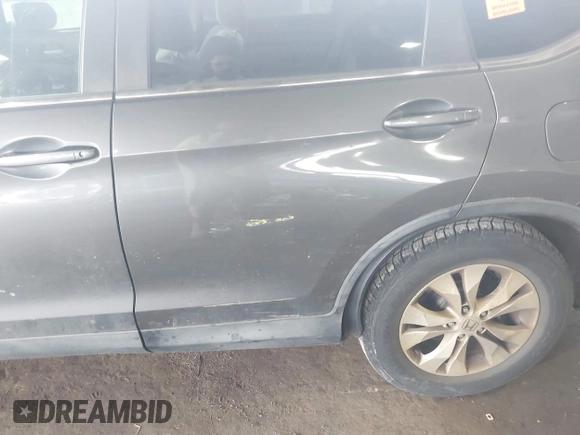 2014 Honda CR-V EX with VIN 2HKRM4H52EH719148, listed as a IAAI auction lot 40448916 with 145,765 mi miles and . Bid and sale history available at DreamBid. Image 6.