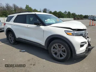 2023 Ford Explorer XLT with VIN 1FMSK8DH3PGB32460, listed as a Copart auction lot 61138545 with 49,434 mi miles and Salvage title. Bid and sale history available at DreamBid. Image 4.