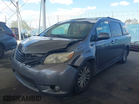 2011 Toyota Sienna XLE AAS with VIN 5TDYK3DC5BS146848, listed as a IAAI auction lot 41914140 with 259,862 mi miles. Bid and sale history available at carsss.com. Image 2.