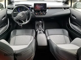 2019 Toyota Corolla Hatchback SE with VIN JTNK4RBEXK3051691, listed as a Copart auction lot 77159164 with 21,051 mi miles and Salvage Title. Bid and sale history available at carsss.com. Image 8.
