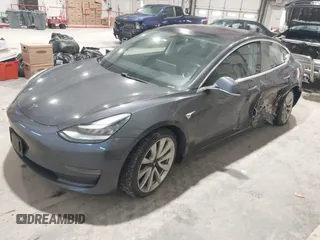 2018 Tesla Model 3 Long Range Battery with VIN 5YJ3E1EB1JF145520, listed as a IAAI auction lot 41360939 with 95,010 mi miles and . Bid and sale history available at DreamBid. Image 19.